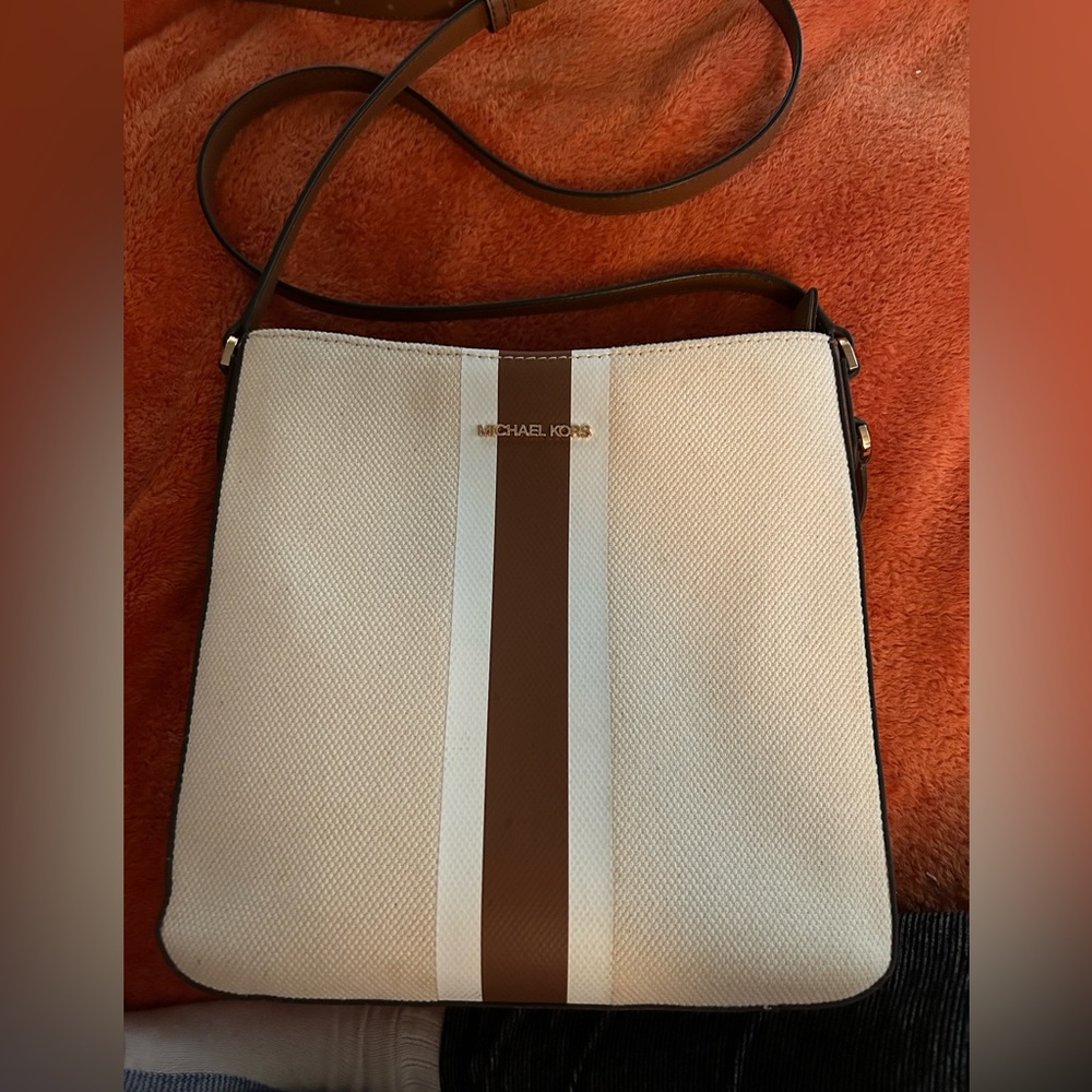 Michael Kors jet set bag.